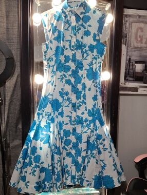 Sleeveless White Dress with Blue Floral Print